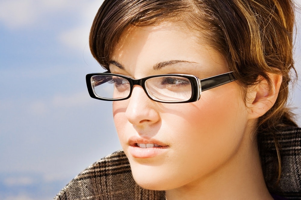 Close up of a woman wearing glasses