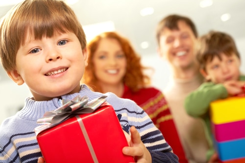 Family and child with gifts